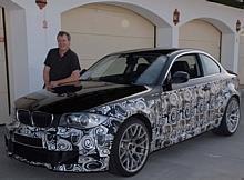 Dr. Kay Segler, Geschäftsführer der BMW M GmbH, zeigte auf dem Ascari Race Track erstmals das neue 1er M Coupé, das im Frühjahr 2011 auf den Markt kommen wird. Foto: auto-reporter.net 